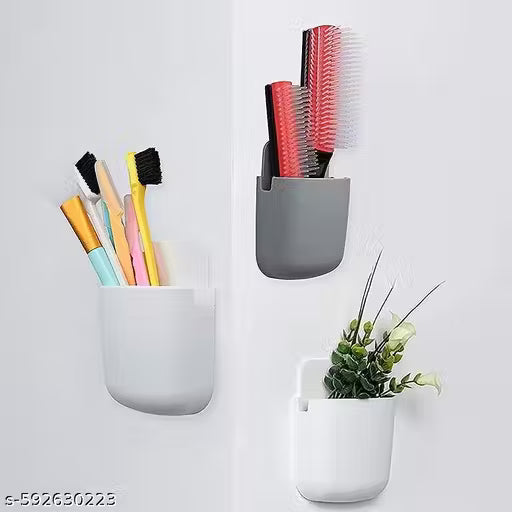 Pack Of 4 Multi-Purpose Wall Mobile / Remote Stand Holder Stand for Charging Mobile Just Fit in Socket and Hang,Wall Mount Hanging Type for All Mobile Mobile Holder